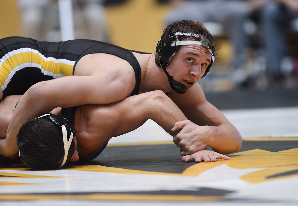 Peyton Mocco attempts to pin Nick Vestal